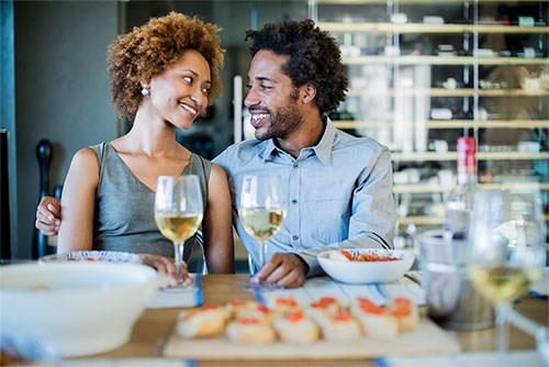 A couple at a table having a dinner date.